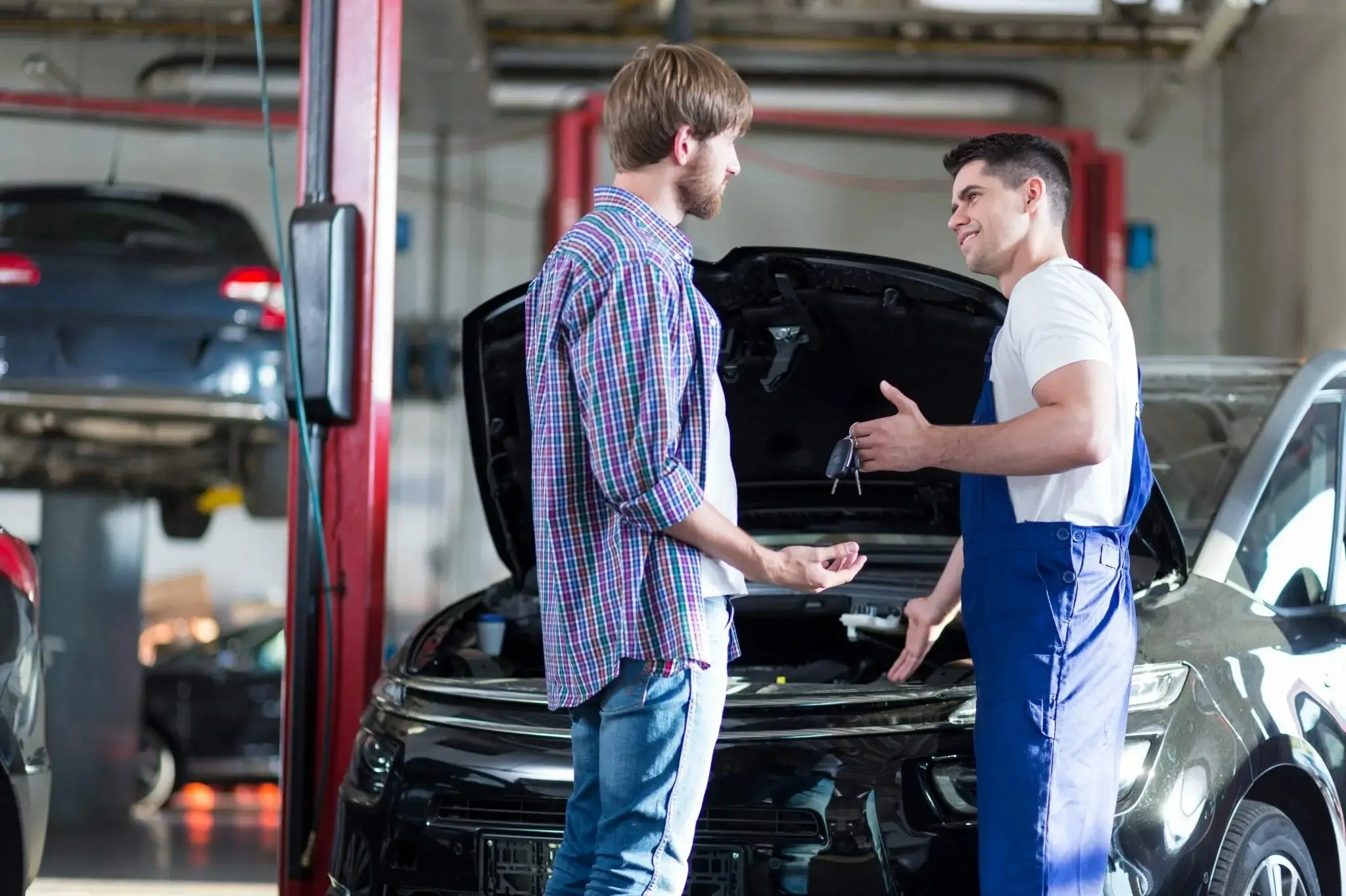 An engineer discussing plans with a client.